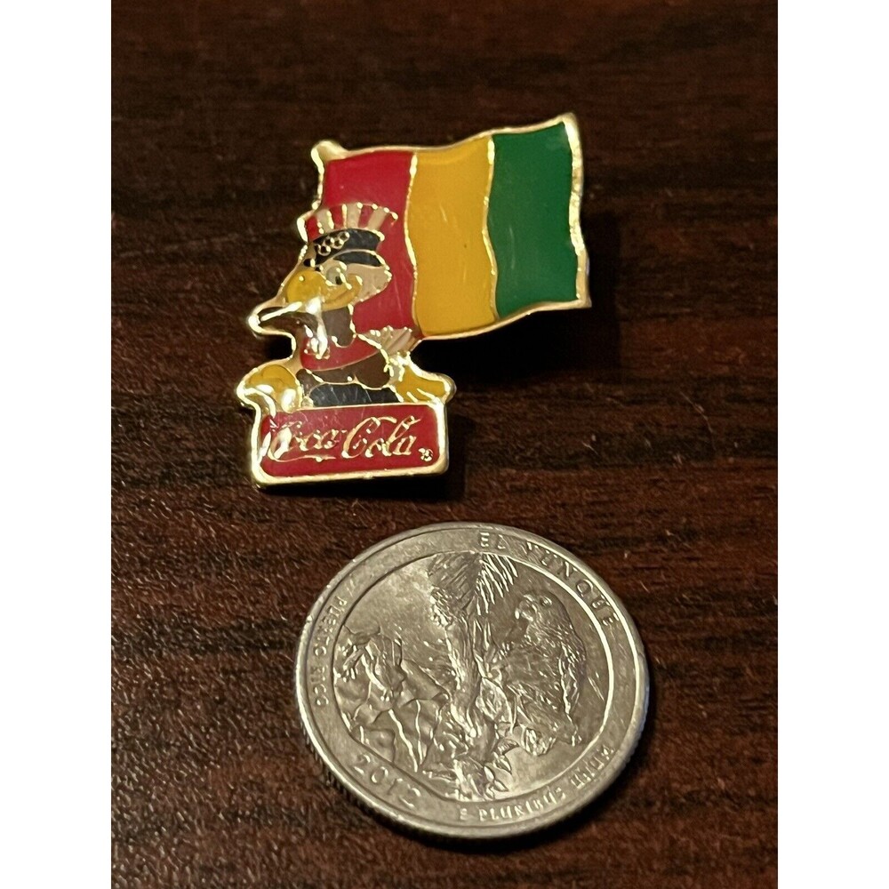 Vintage 1984 Los Angeles Olympics Coca Cola Sam Eagle Guinea Flag Lapel Pin